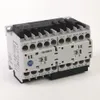 Rockwell Automation / Allen-Bradley 104-K09KF02 – IEC Miniature Reversing Contactor — photo 1 of 2 Rockwell Automation / Allen-Bradley 104-K09KF02 – IEC Miniature Reversing Contactor — photo 1 of 2