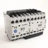 Rockwell Automation / Allen-Bradley 104-K12ZJ02 – IEC Miniature Reversing Contactor — photo 1 of 2 Rockwell Automation / Allen-Bradley 104-K12ZJ02 – IEC Miniature Reversing Contactor — photo 1 of 2